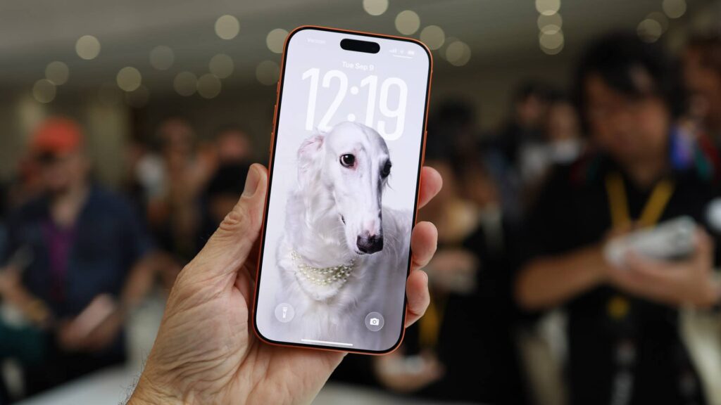 Dog wallpaper shown in iPhone