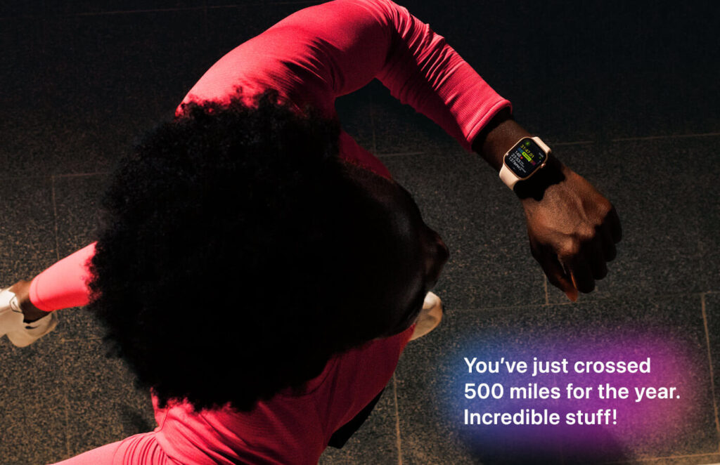 Apple Watch fitness milestone notification celebrating 500 miles achievement