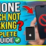 Hand holding an iPhone with a red "no entry" symbol on the screen and text overlay "iPhone Touch Not Working? Complete Fix Guide" with a force restart diagram.