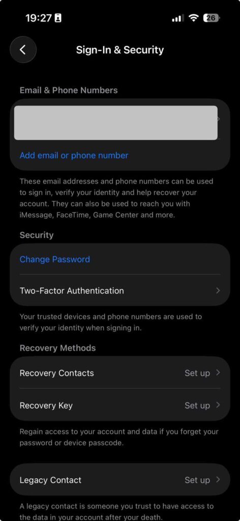 dark mode Apple ID sign in and security settings page with password options