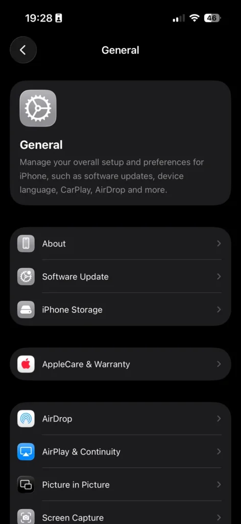 General settings screen with About option visible on an iPhone