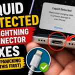 iPhone showing liquid detected warning in Lightning connector with charging port close-up and emergency fix tips