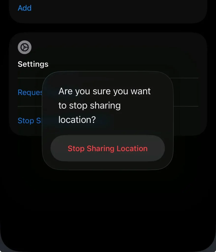 Confirmation message asking whether to stop sharing location with someone on iPhone.