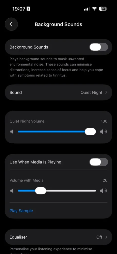 Screenshot of the Background Sounds accessibility settings with sound options and volume controls on iPhone.