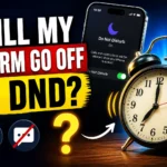 Will My Alarm Go Off in DND? Smartphone showing Do Not Disturb mode beside a ringing alarm clock.